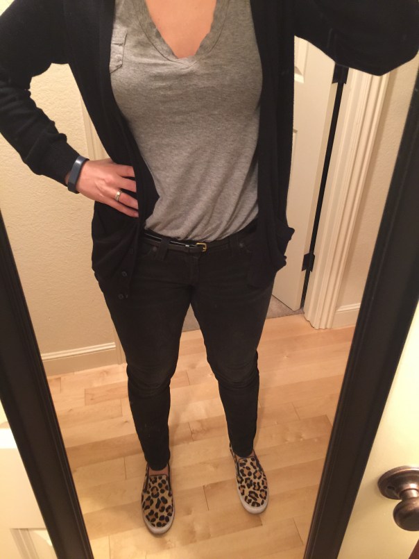 Black cardigan, gray tee, black jeans, black belt, leopard print slip-ons