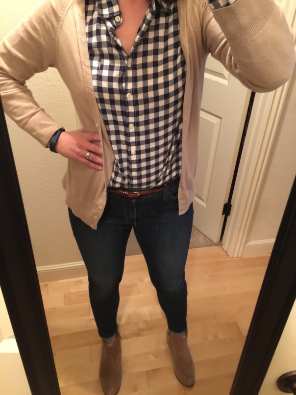 Tan sweater, navy gingham shirt, jeans, suede boots