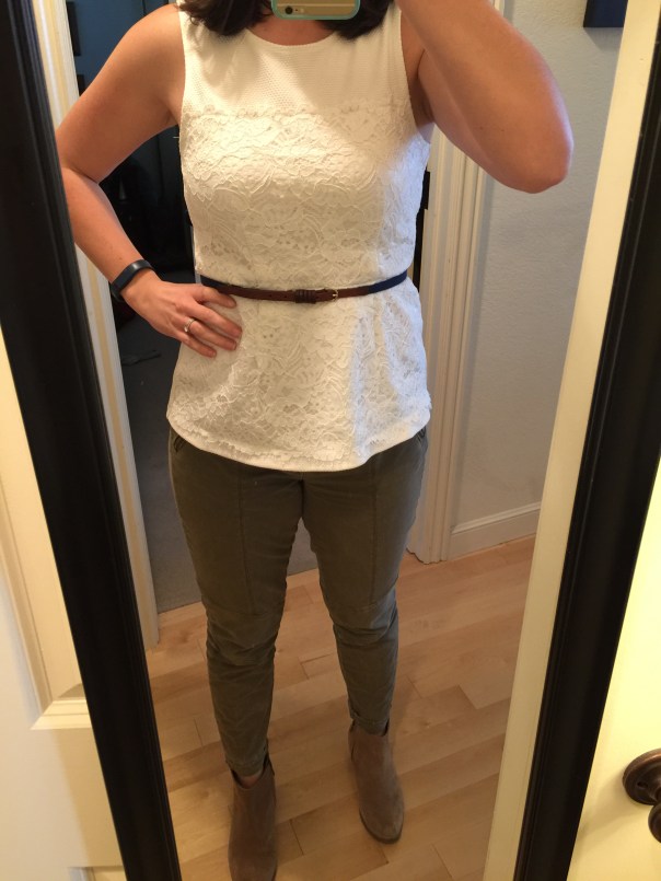 White peplum top, navy belt, olive jeans, suede boots