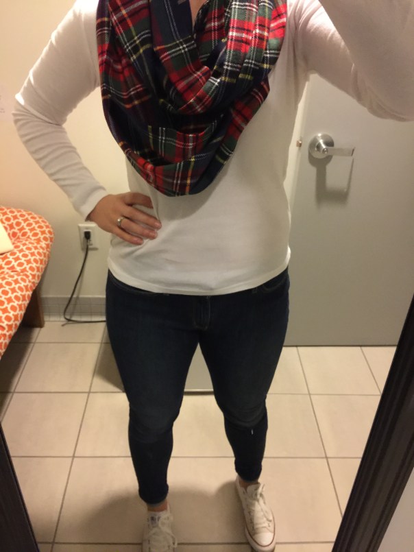 Plaid scarf, white long sleeved tee, black jeans, white Converse
